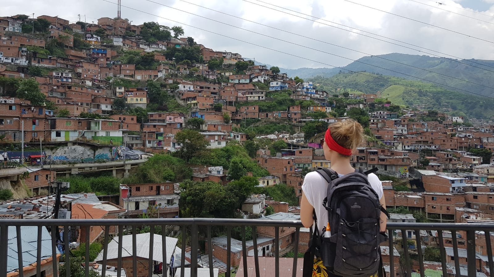 woman looking at medelling colombia