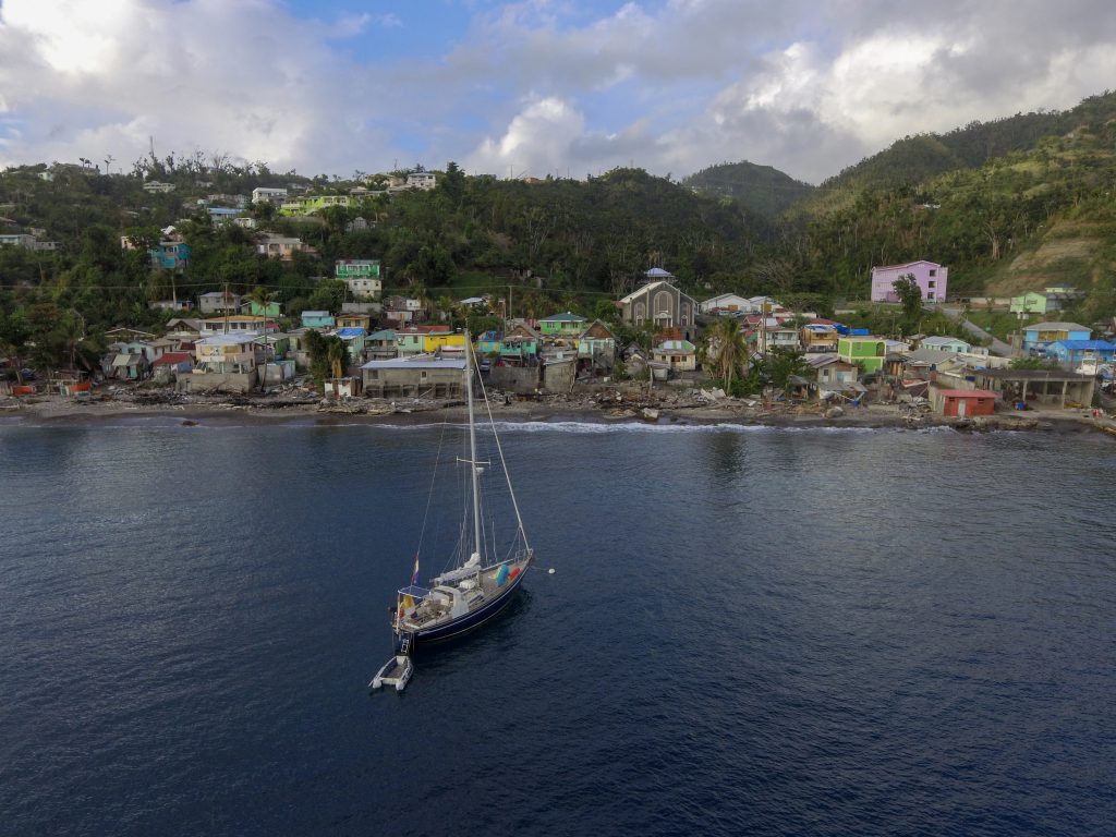 sailboat-before-coast-dominica